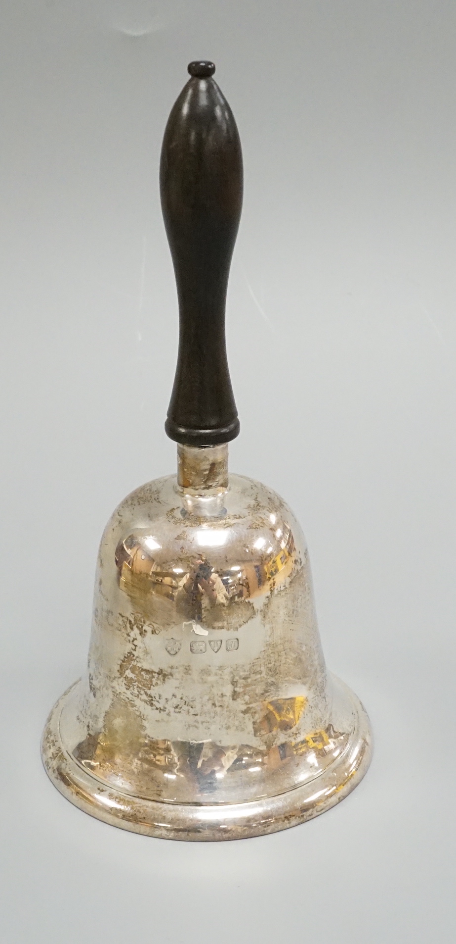 A George V silver hand bell, Chester, 1919, height 14.3cm.